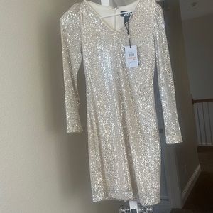 Long sleeve, shirt, and dress size to never worn sequins beige color
